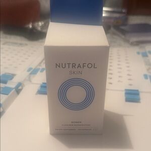 Nutrafol Skin Women Supplement - White and Blue